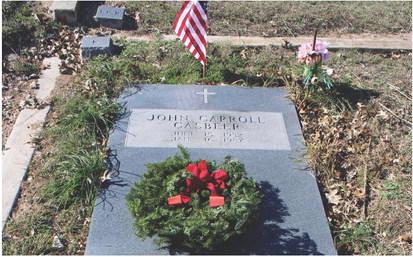 Balsam wreaths such as this one on the grave of John Carroll Casbeer are placed during Wreaths Across America observances in remembrance of those who served to protect freedom and liberty. GREG SMITH | COURTESY PHOTO