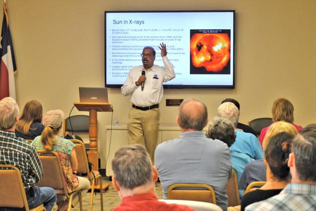 Dr. Nat Gopalswamy addresses an audience at the Lampasas Public Library. The NASA scientist also was at the 580 Sports Complex Monday to study features of the sun during the eclipse. erick mitchell | Lampasas Dispatch Record