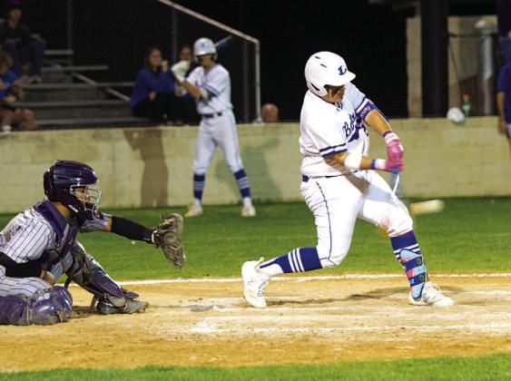 HUNTER KING | DISPATCH RECORD Benny Rodriguez swings at a pitch in Tuesday’s game against the Mustangs.