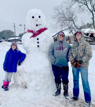 Many residents spent time outdoors enjoying the snow that covered Lampasas County last January. This family created a giant snowman with the frozen precipitation. When the snow and ice returned in February, however, the bitter cold conditions were much harder to endure. KIM LANGFORD | COURTESY PHOTO