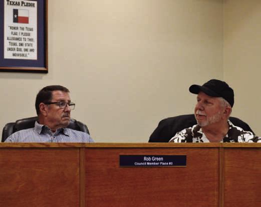 Councilmen Rob Green, left, and Thomas Combs discuss the proposed 2026-2027 budget for the city of Kempner. Elimination of a setaside for a future municipal court judge salary has enabled the Kempner City Council to lower the tax rate for the upcoming year. ERICK MITCHELL | DISPATCH RECORD