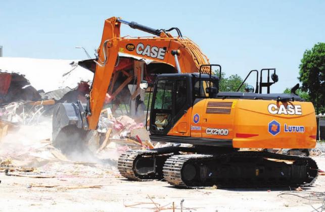 An old convenience store was demolished Friday afternoon to make way for a new Starbucks in Lampasas. HUNTER KING | DISPATCH RECORD