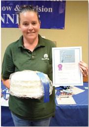 Amanda Smith won adult champion of baked goods with her hummingbird cake. ALEXANDRIA RANDOLPH | DISPATCH RECORD