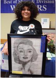 Amira McDonald won junior champion in art with a Marilyn Monroe pencil drawing. ALEXANDRIA RANDOLPH | DISPATCH RECORD