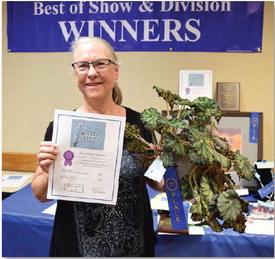 Gail Eltgroth won adult champion honors in horticulture with a begonia. She also was named adult champion in canned goods. ALEXANDRIA RANDOLPH | DISPATCH RECORD