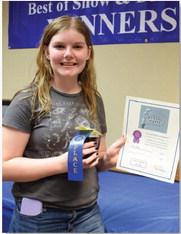 Audrey Wallace won junior champion for canned goods with her strawberry jam. ALEXANDRIA RANDOLPH | DISPATCH RECORD