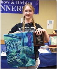 Daphne Davenport won intermediate champion in art with her piece titled “Acrylic woman in mirror.” ALEXANDRIA RANDOLPH | DISPATCH RECORD