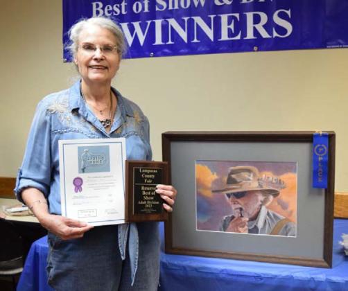 Marilyn May won adult champion in art with her cowboy colored pencil piece. ALEXANDRIA RANDOLPH | DISPATCH RECORD
