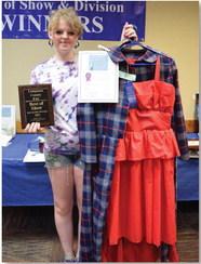 Katelyn Martin won intermediate champion of textiles with a wool coat and red dress. ALEXANDRIA RANDOLPH | DISPATCH RECORD