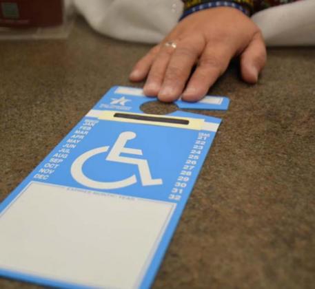 Those who have a disabled veteran license tag with the ISA symbol are eligible to use parking spaces reserved for persons with disabilities. monique brand | dispatch record