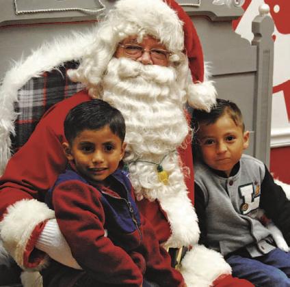 Children of all ages are invited to visit with Santa from 3:30-6 p.m. Dec. 2 at the downtown Ajinomoto Foods lobby during the Carol of Lights festivities to usher in the Christmas season. FILE PHOTO
