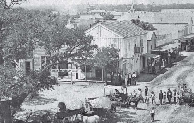 Jerry Scott’s Lampasas Saloon, later the Gem saloon, was located near the north end of the west side of the courthouse square. The “Dead Man’s Saloon” was destroyed by a fire in 1884. The buiding was located behind the tree in this photo. COURTESY PHOTO | lampasas county museum