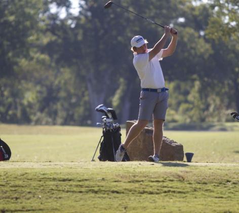 HUNTER KING | DISPATCH RECORD Jaxon Tomme follows through on a drive on the fourth tee box during the home tournament at Hancock Park Golf Course in Lampasas on Oct. 8.