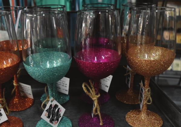 These glittery wine glasses are made in-house at the Jessie Dallas Boutique in Kempner. MADELEINE MILLER | DISPATCH RECORD
