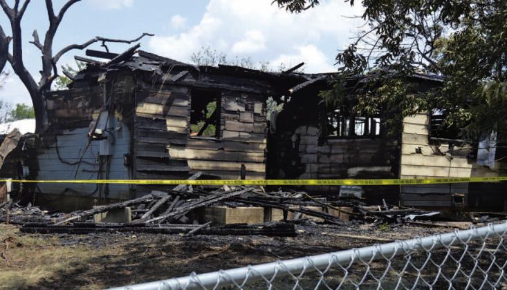 An early-morning fire Friday damaged this structure at 721 Brown St. ERICK MITCHELL | DISPATCH RECORD