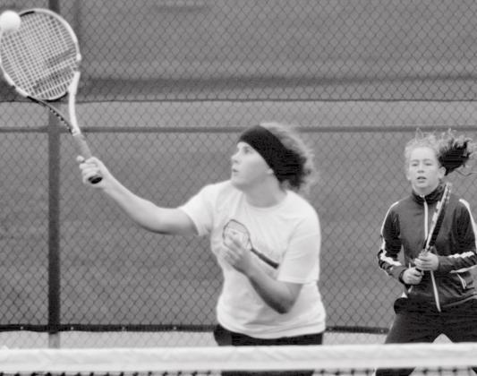 Abby Valdez, right, earned first-team all-district in tennis singles, and second-team in doubles, with Kailr Clements, shown hitting the ball. JEFF LOWE | DISPATCH RECORD