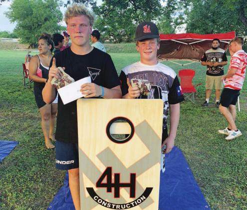 Cayhil Isom and Preston Isom were the winners of the upper bracket of the cornhole tournament which featured 72 teams. COURTESY PHOTO