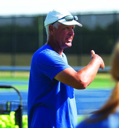 Kenneth Peiser talks with tennis players during 2023. FILE PHOTO