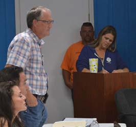 KWSC General Manager Bruce Sorenson addresses water customers who gathered at last week’s board meeting. ERICK MITCHELL | DISPATCH RECORD
