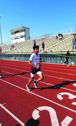 COURTESY PHOTO | AUSTIN MARTIN Taelor Singleton (Hornet runner above) and Eric Perez (in photo at right) ran at the cross country meet in Brownwood this week.