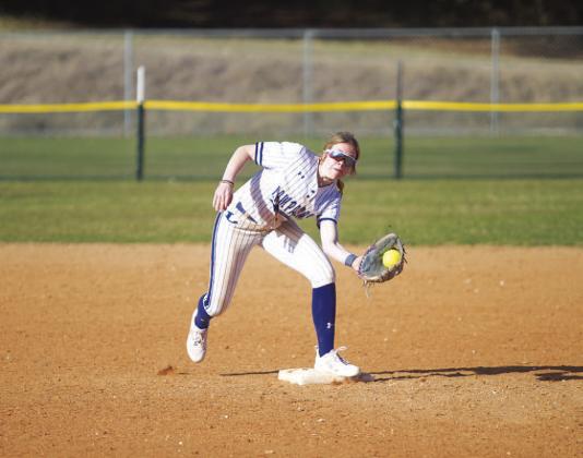 Aspen Wheeler catches the ball and steps on second base to record an out during the Lady Badgers’ game against Troy. HUNTER KING | DISPATCH RECORD