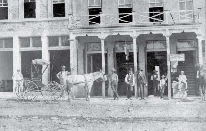 Buildings around downtown square served as courthouse sites prior to 1884