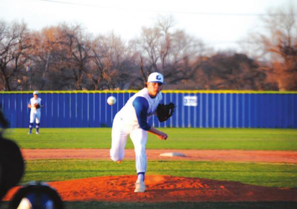 Tak Stinnett tosses a pitch on his way to completing seven full innings to beat Brownwood on Tuesday night. HUNTER KING | DISPATCH RECORD