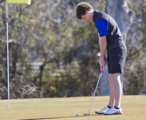 Aiden Wiley putts on Hole No. 1 at Hancock Park Golf Course on Monday. JEFF LOWE | DISPATCH RECORD