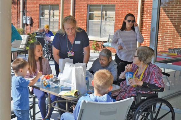 Lampasas Nursing and Rehabilitation Center residents and visitors were treated to a hot dog lunch for Thursday’s Easter celebration. erick mitchell | dispatch record