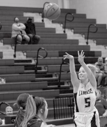 Laurcy Bender makes her second three-pointer of Saturday’s win over Academy. JEFF LOWE | DISPATCH RECORD