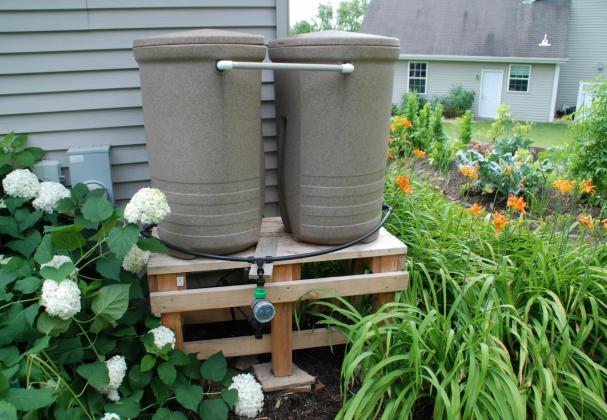 Elevate your rain barrel for easier access to the spigot for filling containers and to speed water flow with the help of gravity. COURTESY PHOTO | MELINDAMYERS.COM