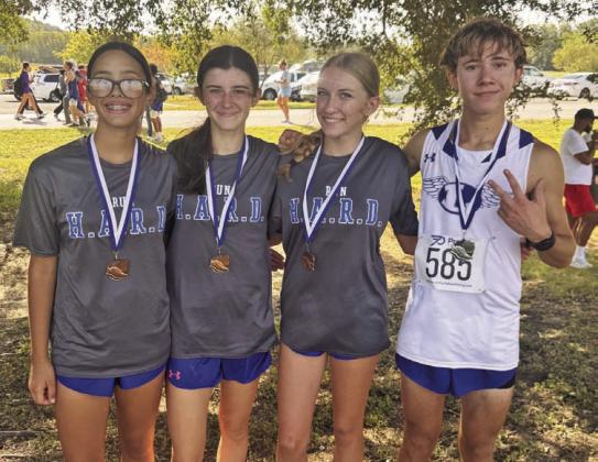 KIMBERLY BURNSIDE | COURTESY PHOTO From left, Addi Ortegon, Alix McMasters, Hadlee McCorkle and Cohen Watson wear the medals they brought home from Friday’s Temple Invitational.
