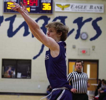 HUNTER KING | DISPATCH RECORD Peyton Sisson releases a three-point shot in the fourth quarter of last Friday’s game.