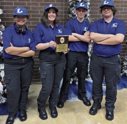 Lampasas High School students, from left, sophomore Lena Jeffries, freshman Lilian Stephen, and juniors Jason Brock and Bryce Neeley celebrate their first-place regional victory in the Felony Traffic Stop category. VERONICA BUTLER | DISPATCH RECORD