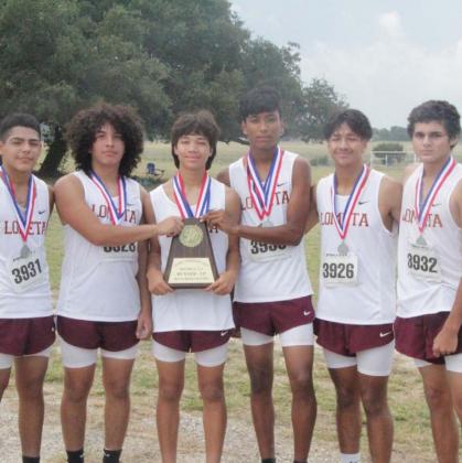 JESSICA MALDONADO | DISPATCH RECORD The Lometa boys’ cross country team poses with a trophy and medals after finishing second at the district cross country meet in Lometa.