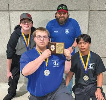 The LHS fire agility team took home silver at the state competition. Pictured, back row, from left, are Tony Carey and instructor Steve Haviland; front row, Joseph Walden and JD Obeda. erick mitchell | dispatch record