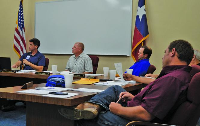 Superintendent Dr. Chane Rascoe, at left, and Lampasas school board members listen to a presentation Monday as they consider new disciplinary policies for students who bring prohibited substances to campus. ERICK MITCHELL | DISPATCH RECORD