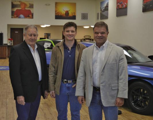 Three generations of the Benny Boyd family will celebrate the local car dealership’s 30th anniversary with a special barbecue for the public on Friday. Pictured here are Benny Boyd Sr., grandson Blaine Boyd and Benny Boyd Jr. ERICK MITCHELL | DISPATCH RECORD