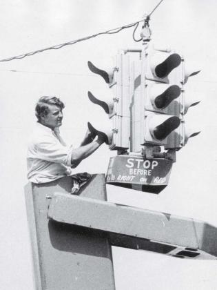 In the weeks preceeding the annual Spring Ho Festival, city crews get out and spruce up the town. In 1973, the clearn-up effort included polishing the traffic lights. file photo | lampasas dispatch