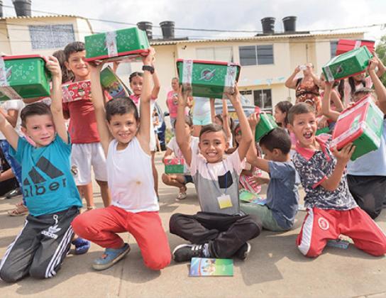 Operation Christmas Child prepares shoebox gifts for children such as these in countries around the world. COURTESY PHOTO | SAMARITAN’S PURSE
