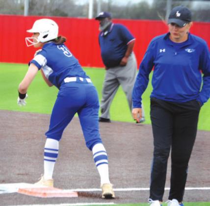 Hannah Perry stands on first after a single in the Lady Badgers’ contest in Salado last week. HUNTER KING | DISPATCH RECORD