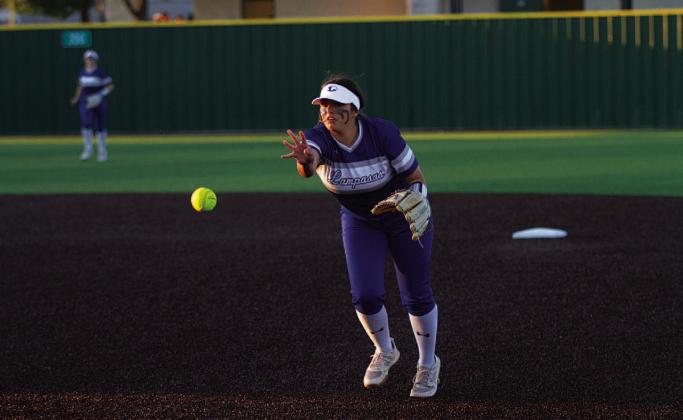 HUNTER KING | DISPATCH RECORD Julia Ybarra tosses the ball to first to record an out during last week’s game against Burnet.