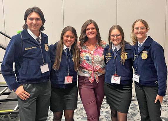 At the recent Texas FFA Convention, Lampasas FFA members attended a session hosted by the “Farm Babe,” Michele Miller of Florida. Miller is an advocate for agriculture who works daily to dispel myths about the food industry and promote understanding about production agriculture. Pictured, from left to right, are Jonathan Harris, Jacie Resa, “Farm Babe” Michele Miller, Paige Rutland and Phoebe Rounds. COURTESY PHOTO | JUDY HAIL