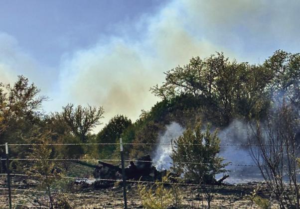FILE PHOTO Smoke from a past wildfire is shown. Lampasas County remains under a burn ban.