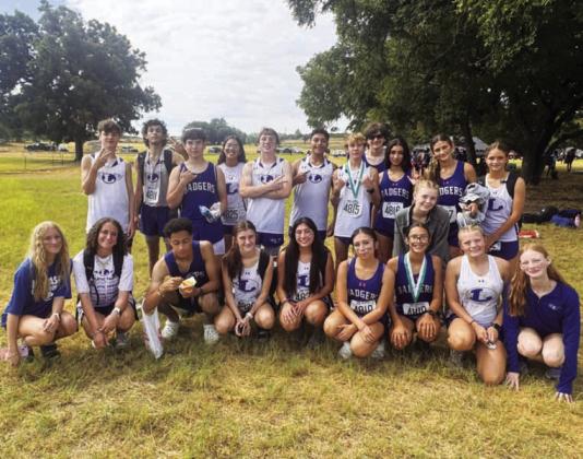 The Badger cross country team poses for a eam photo after Friday’s meet at Floyd Farms in Lampasas. COURTESY PHOTO