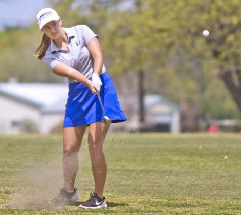 Shaylee Wolfe hits an approach shot at Gatesville Country Club on Monday. JEFF LOWE | DISPATCH RECORD