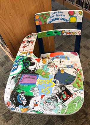 A desk depicting the works of Dr. Seuss was submitted by a local artist to the 2022 Painted Chair Event fundraiser. courtesy photo | Lampasas Public Library