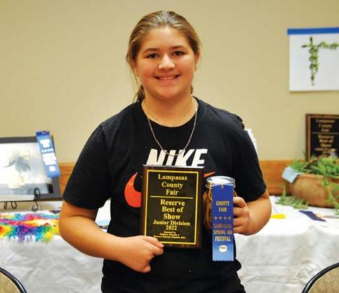 Kambry Tower won co-reserve best of show in the junior division for her red chili dill pickles. MASON HINES | DISPATCH RECORD