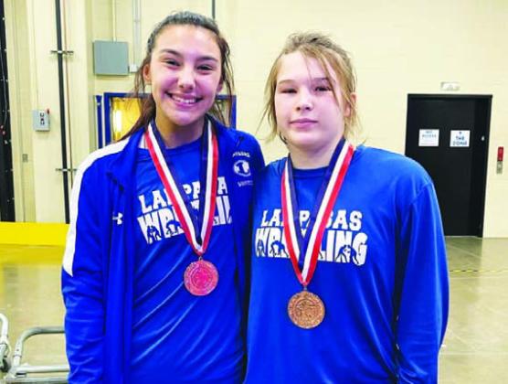 COURTESY PHOTO | LAMPASAS WRESTLING Charlie Freese, left, and Taylor Martell pose with their medals.