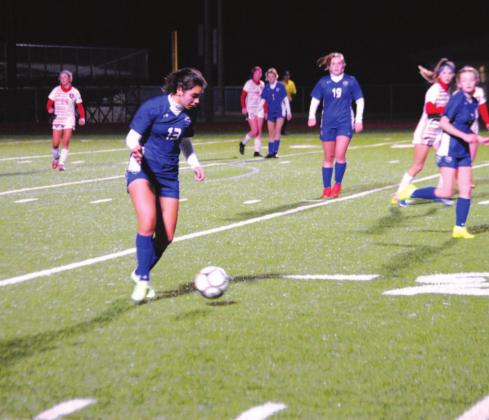 Tate Brown dribbles in the midfield and moves the ball up the field against the Salado Lady Eagles on Wednesday night. HUNTER KING | DISPATCH RECORD
